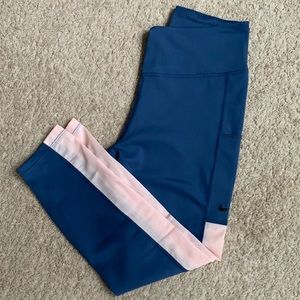 Nike Capri leggings with sheer leg. Size medium women’s.  NWOT.